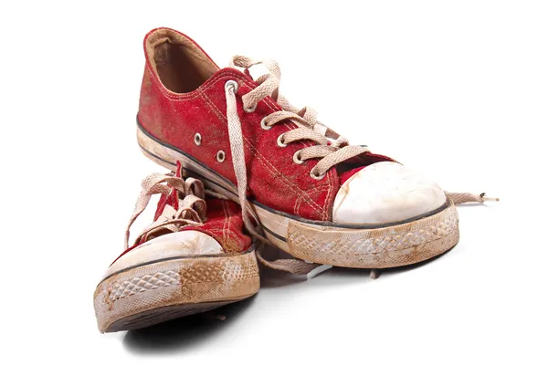 Пара грязных кроссовки — стоковое фото