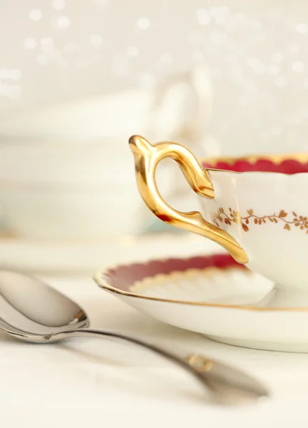 Крупным планом чайная чашка и ложка Стоковое Фото