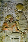 Фараон Сети на коленях у богини Исиды